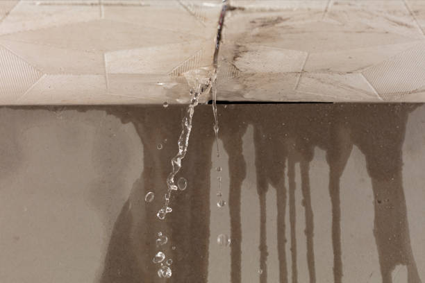 Professional Flood Damage Cleanup technician working in Ashland, CA